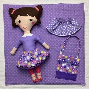 Girls of the world doll, purple quilt, two skirts, purse